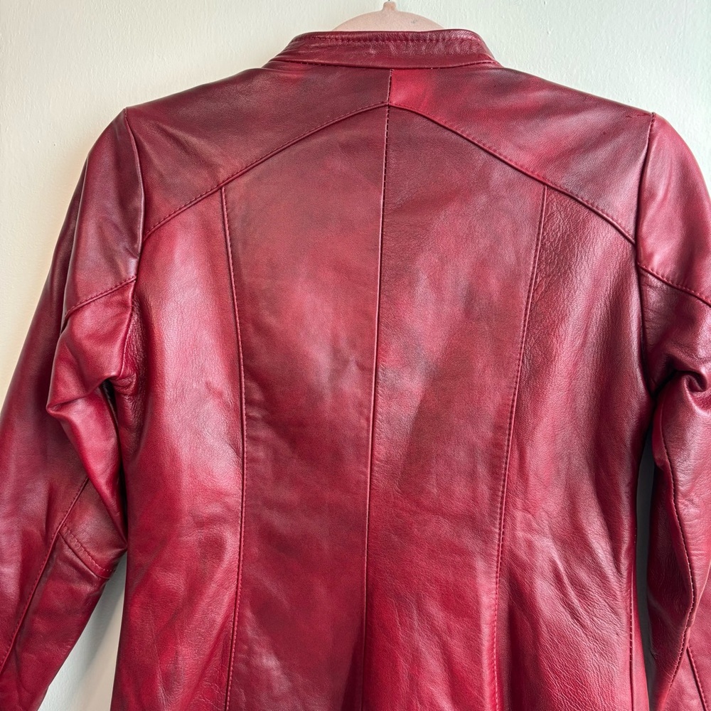 Chic Red Leather Jacket With Patterned Accents - image 7